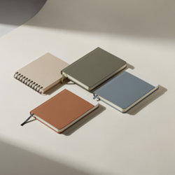 Carnet A6 publicitaire personnalisé pour la mobilité Carnets A6 publicitaires en simili-cuir, kraft recyclé, bambou, liège et papier de pierre