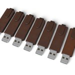 Clé USB cuir publicitaire personnalisée avec logo gravé pour entreprise et communication