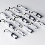 Porte-clés lampe torche publicitaire personnalisé avec logo pour entreprise et communication